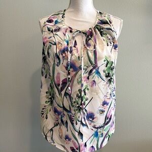 A NEW YORK  FLOWERY sleeveless pullover, V-neck 100% polyester size extra small